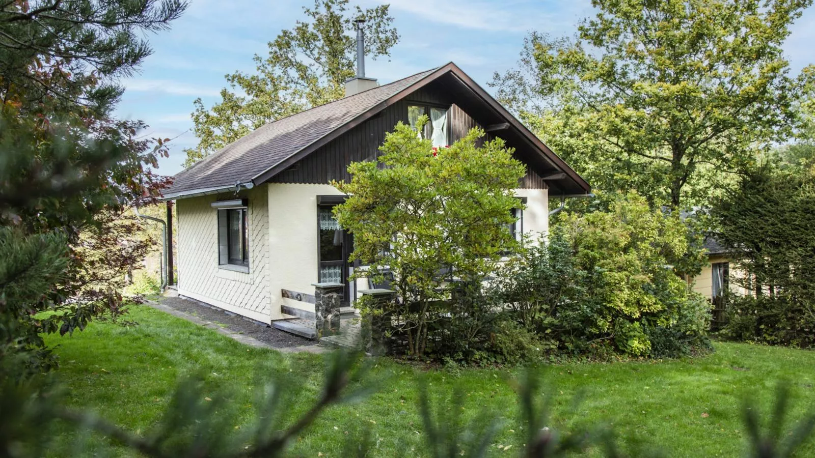 Das Haus am Wald-Buitenkant zomer