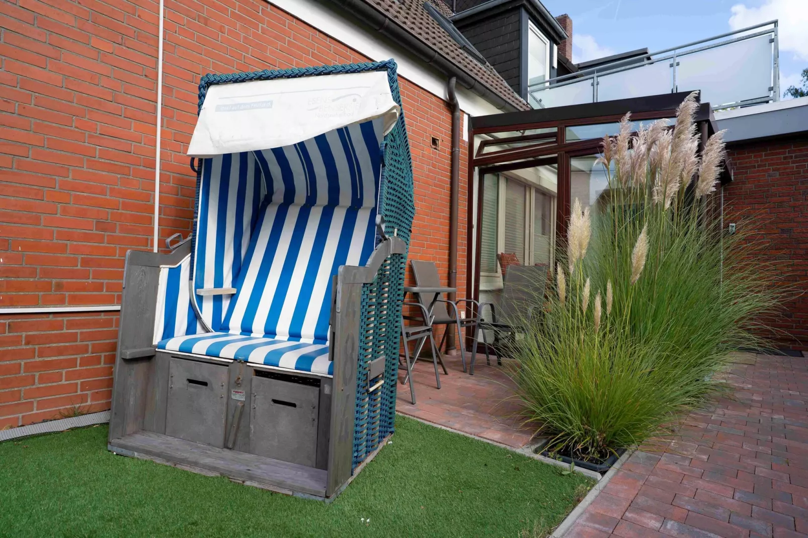 Haus Strandkorb 6-Tuinen zomer