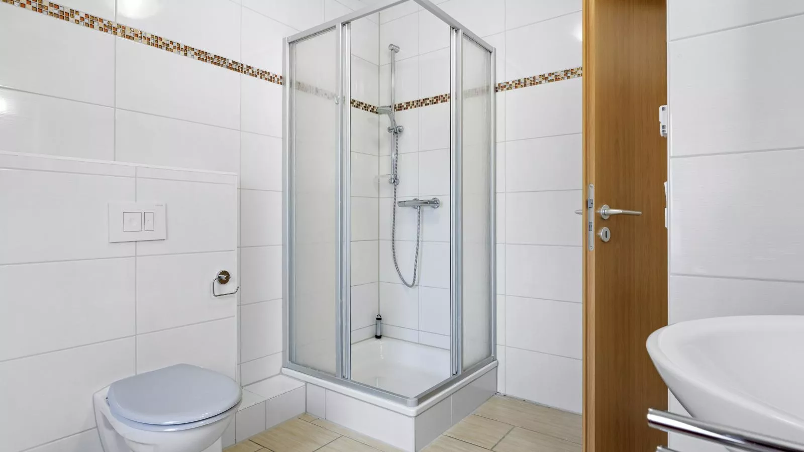 Stranddistel links mit Sauna-Badkamer