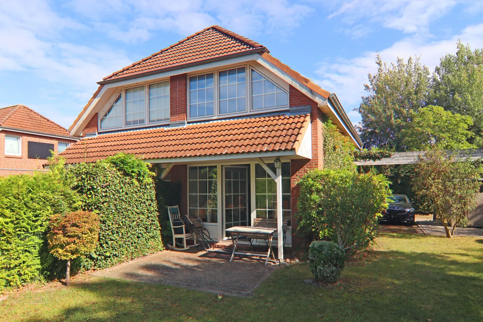 Ferienhaus Rebhuhnweg-Buitenkant zomer