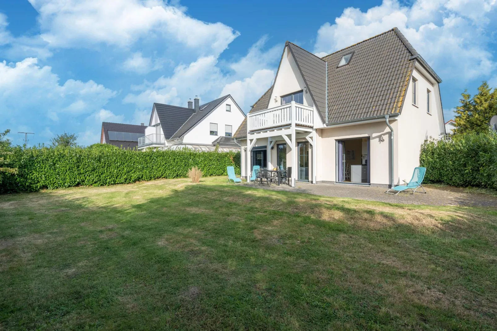 Minihus - Erdgeschoss mit Terrasse-Buitenkant zomer