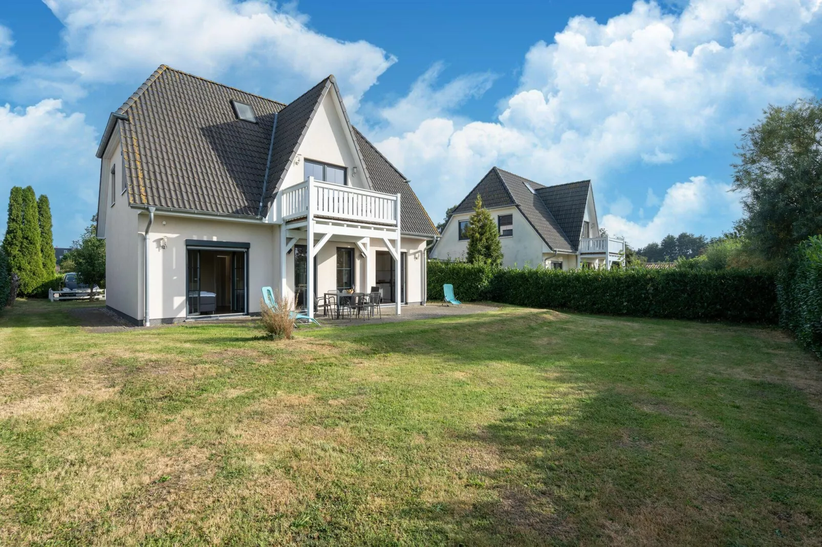 Minihus - Erdgeschoss mit Terrasse-Buitenkant zomer