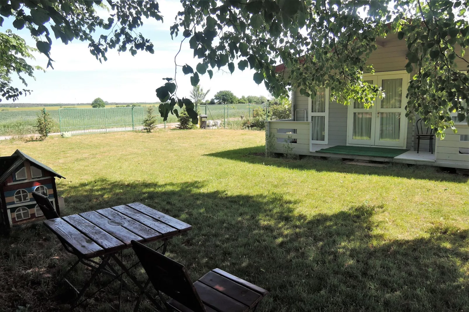 Bungalow Pod lipą Wrzosowo-Tuinen zomer