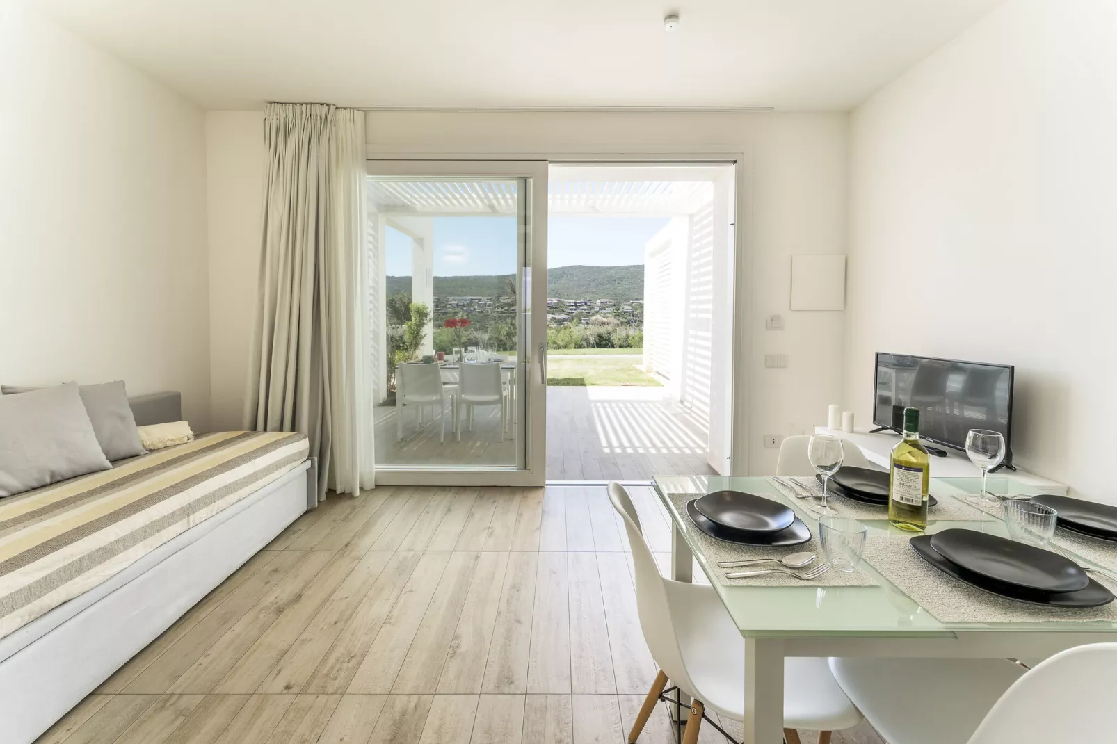 Residence Capo Falcone Stintino "Bilo 4 Comfort"-Woonkamer