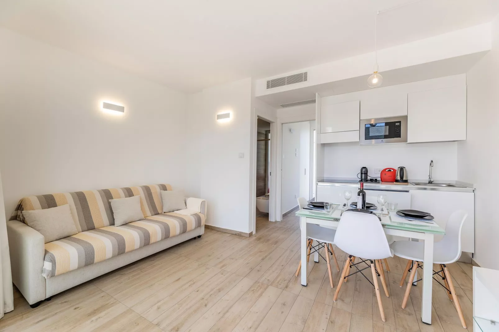 Residence Capo Falcone Stintino "Bilo 4 Premium"-Woonkamer