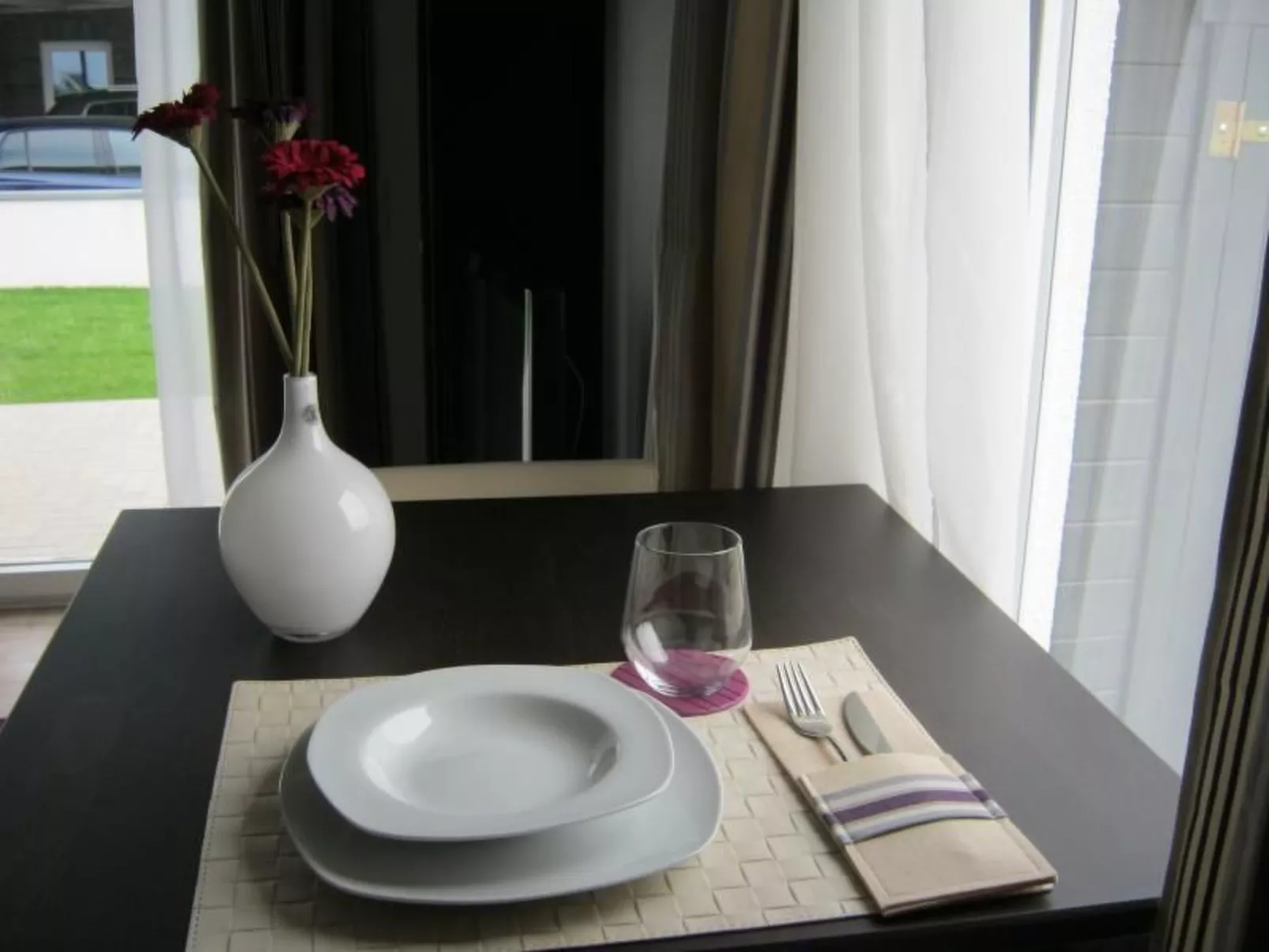 Wohnung im Erdgeschoss mit Terrasse und Stellplatz