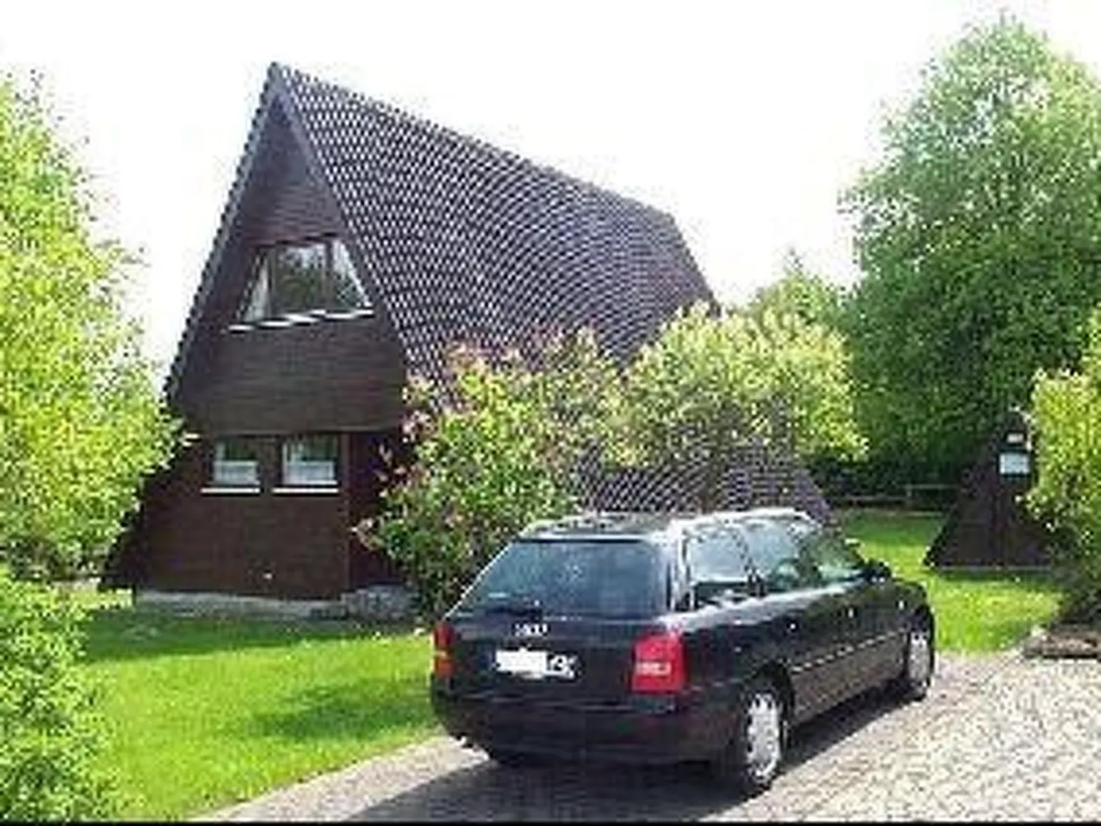 Spitzdachferienhaus mit Schwedenofen und Garten