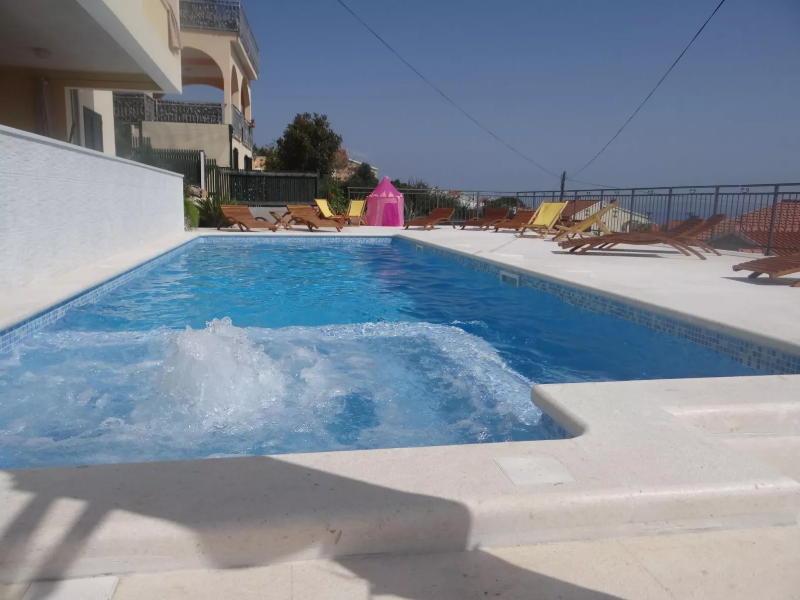 Ferienwohnung, Meerblick Terrasse beheizter Pool-Buiten