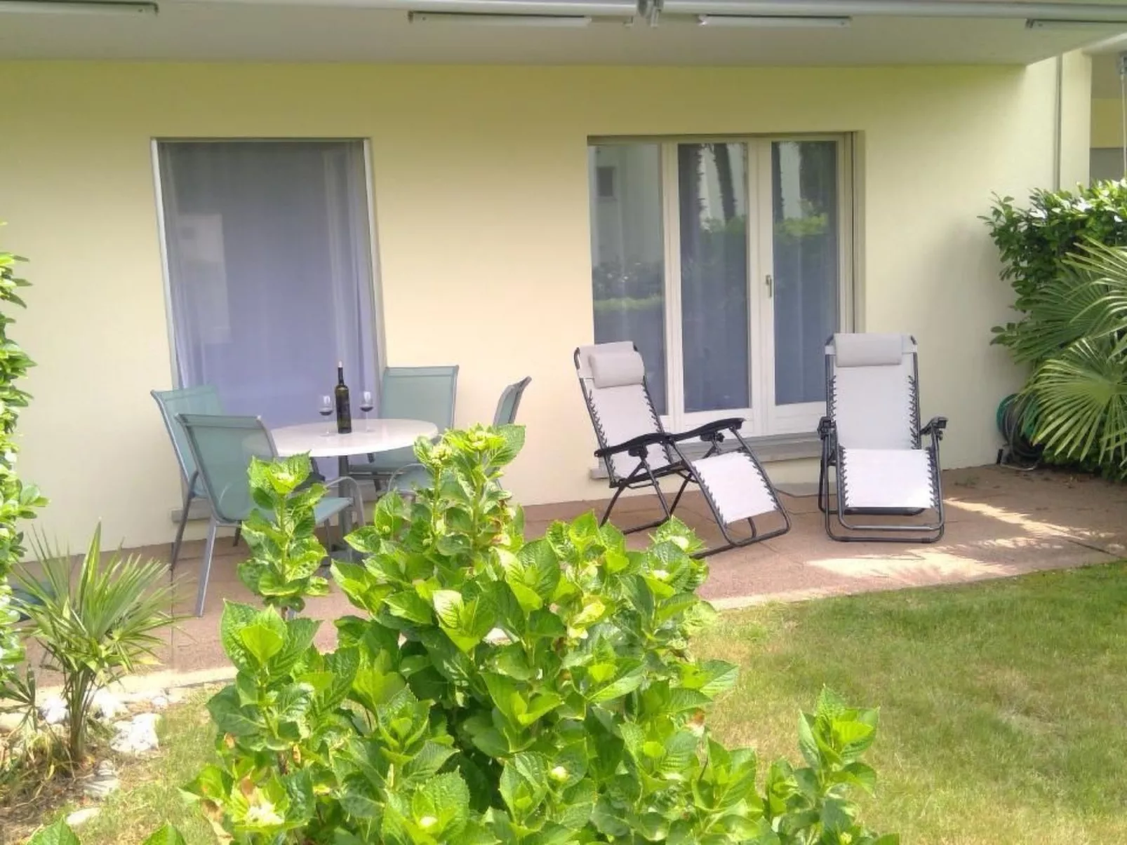 Gartenwohnung im Tessin mit Swimmingpool-Buiten