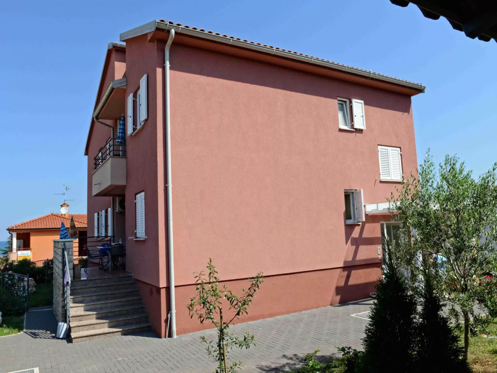 Strandnahe Ferienwohnung mit großem Garten-Buiten