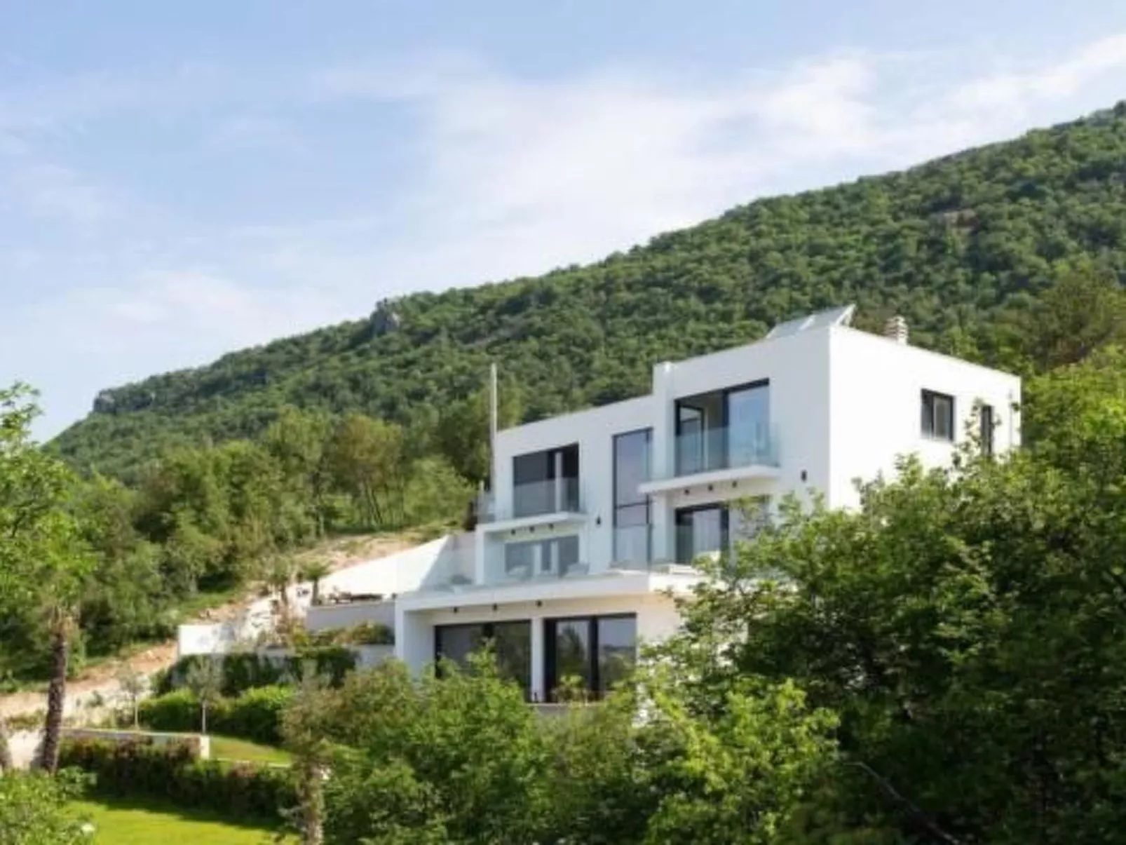 Designferienhaus mit Hot Tub-Buiten