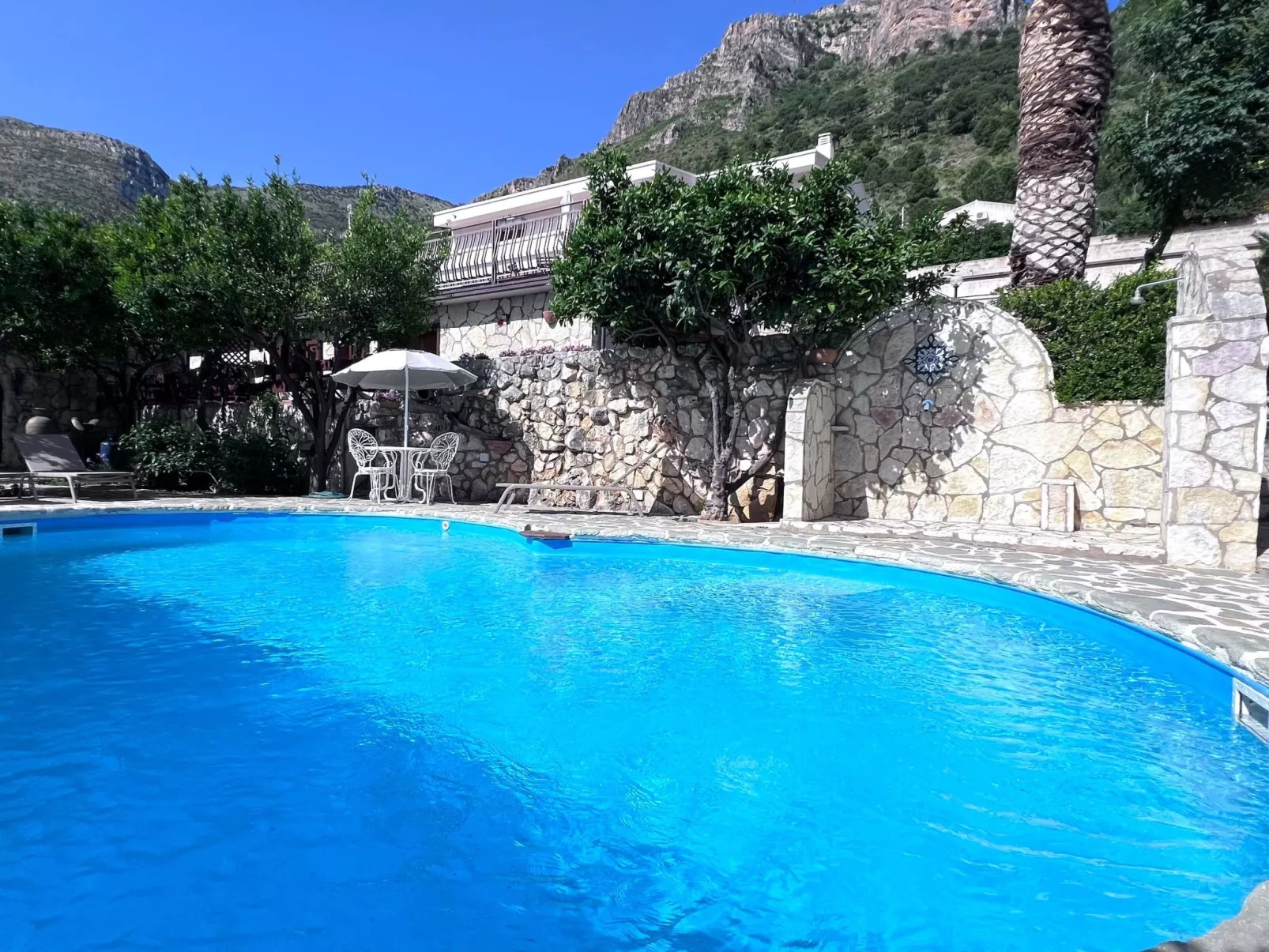 Studio-Wohnung "P Melograno" mit Pool-Buiten