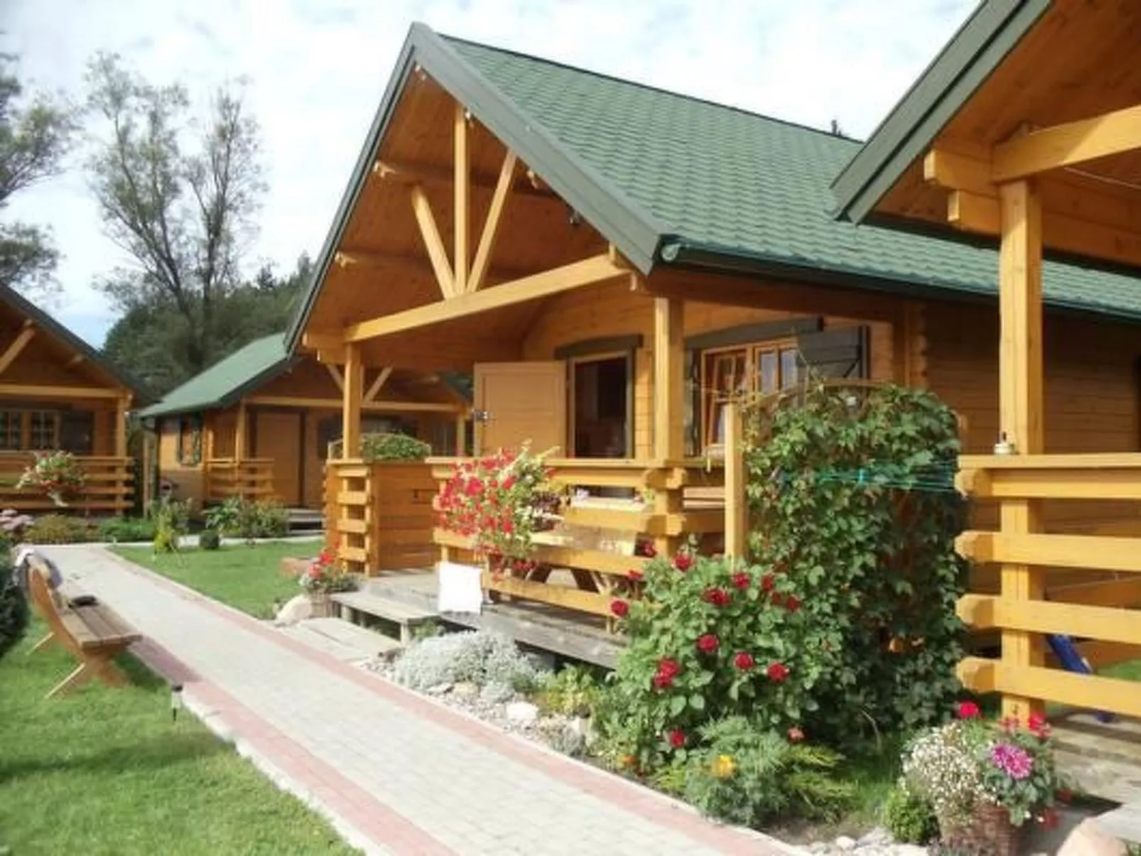 Gemütliches Holzferienhaus mit Grill und Garten-Buiten