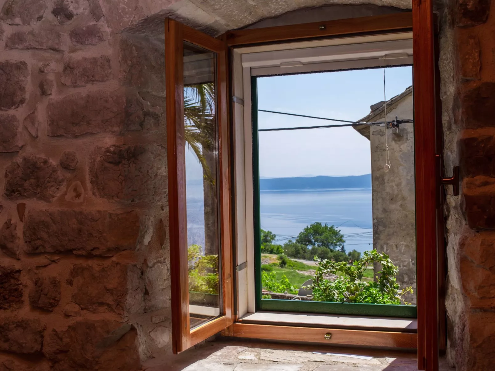 Mit Blick auf das Wasser-Buiten