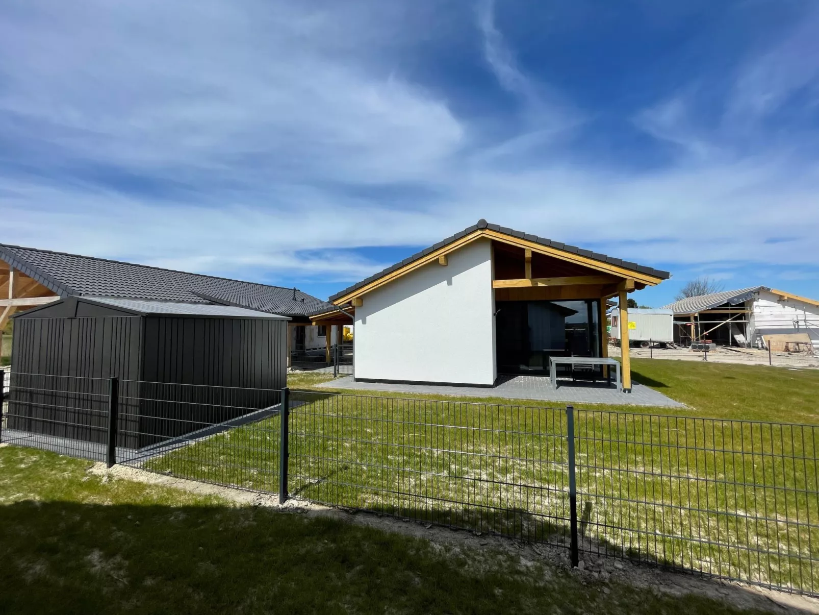 G12 Ferienhaus in Eckwarderhörne mit Gartenhaus - Buiten