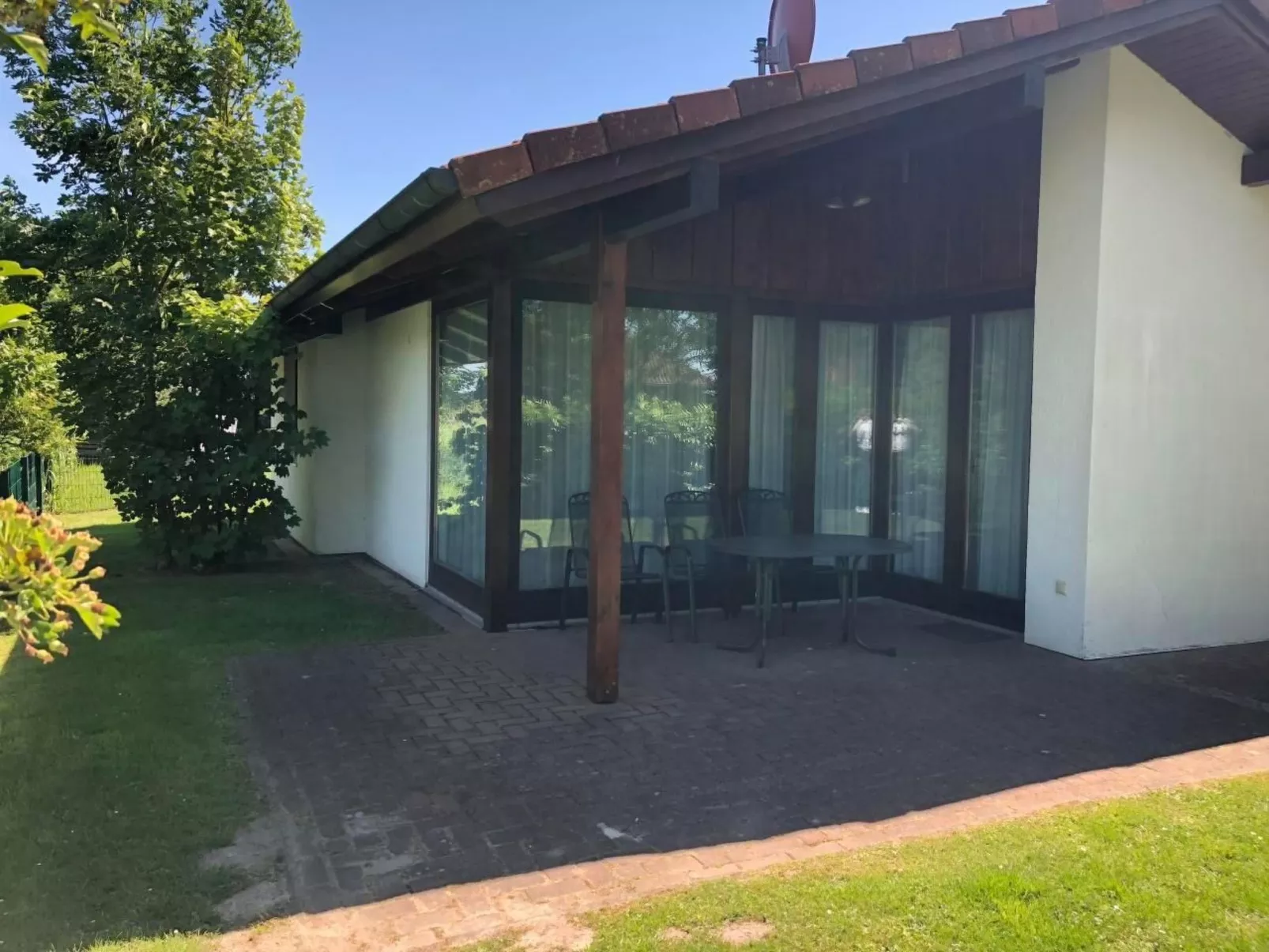 K5 Haus in Eckwarderhörne mit Terrasse und Garte - Buiten