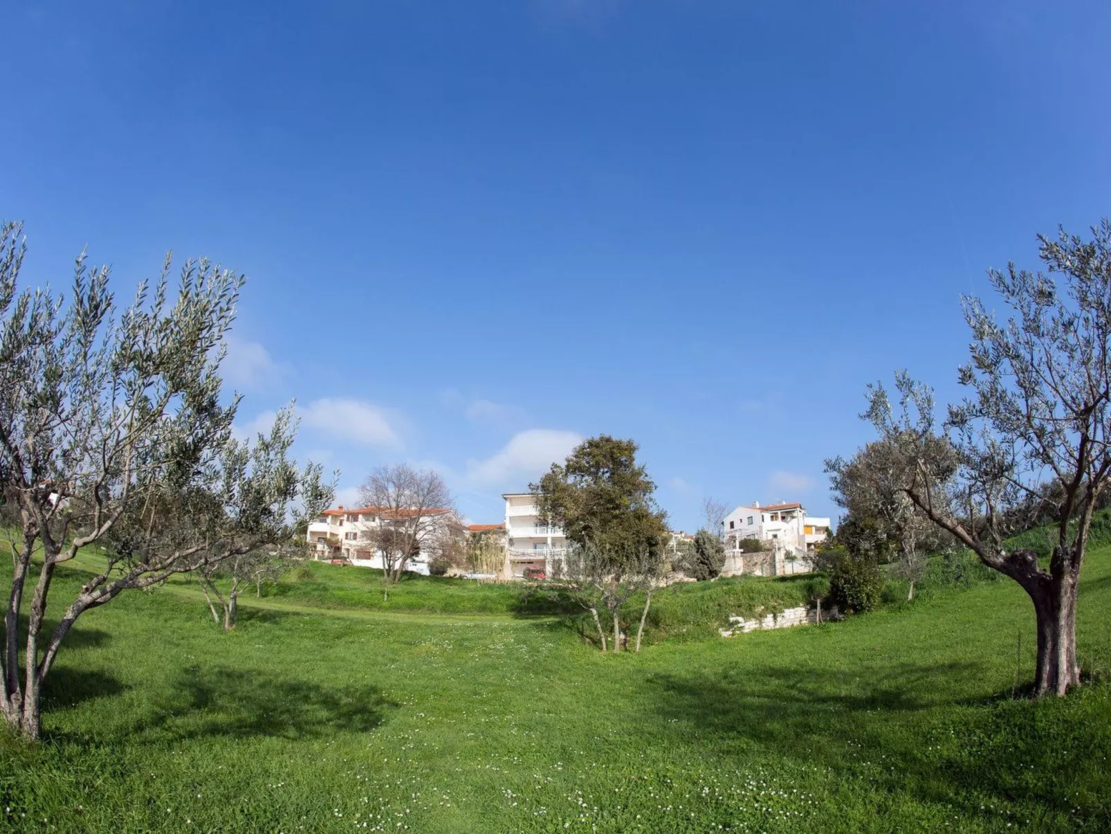 Direkt am Strand-Buiten