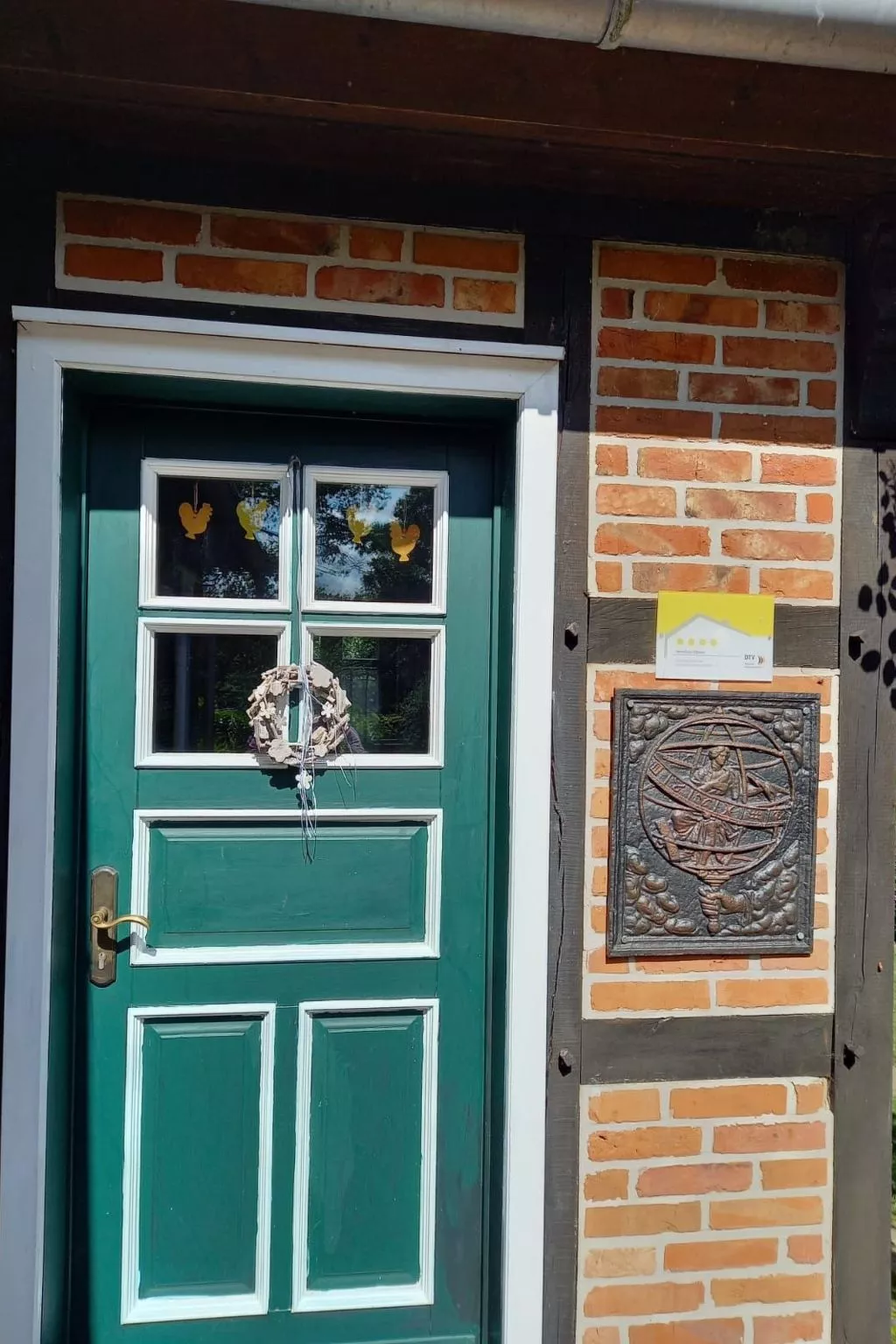 Haus Elbrose inmitten von Rosen mit Elbdeichzugang-Buiten