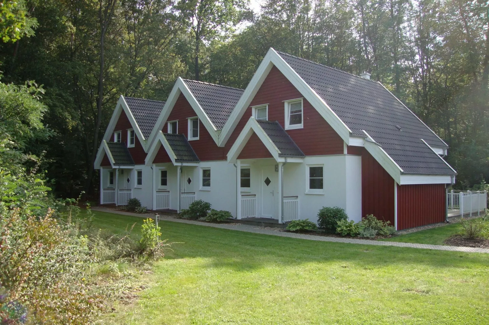 Familienhaus am Wald-Buitenkant zomer