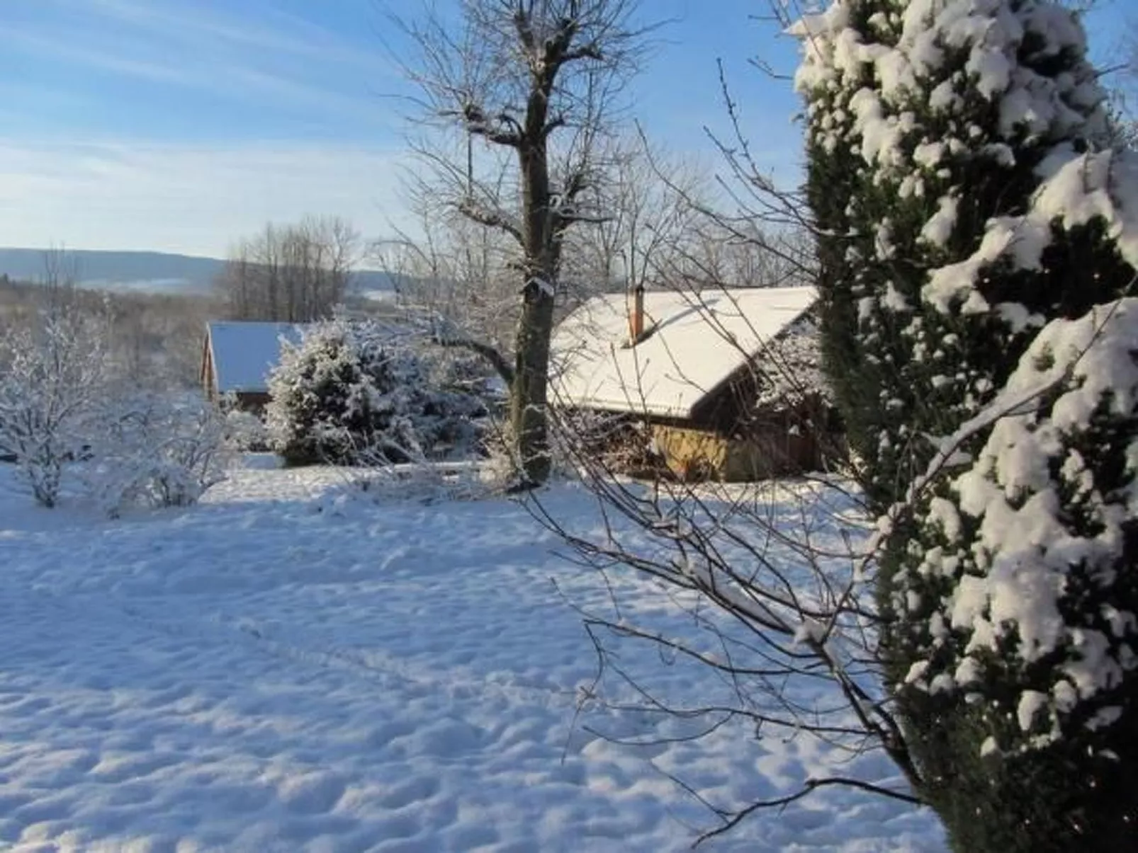 Blockhaus in Gajówka mit Kaminofen-Buiten