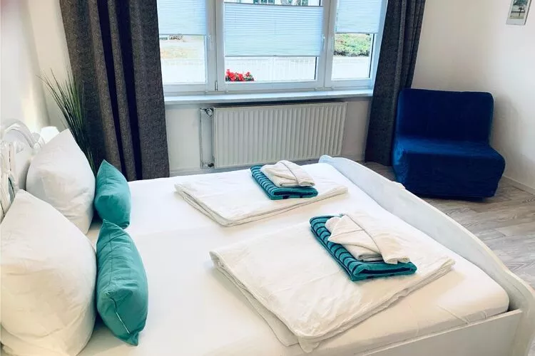 Ferienhaus Kapitänshus Gesamt / 1-14 Personen-Slaapkamer