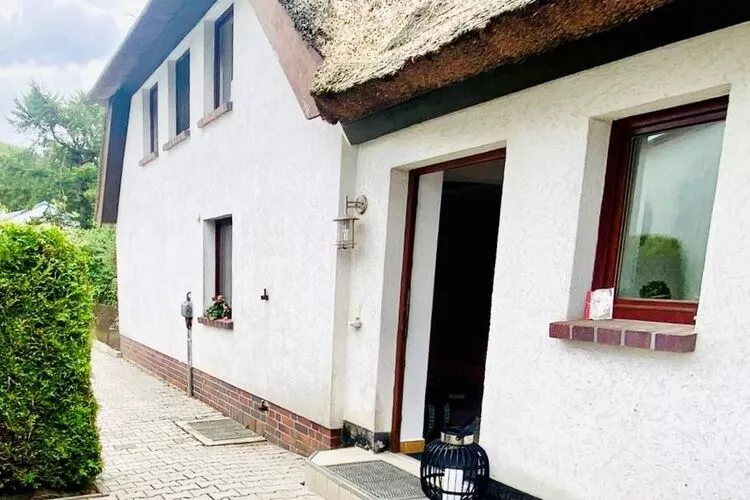 Ferienhaus Kapitänshus Gesamt / 1-14 Personen-Buitenkant zomer