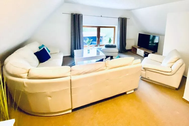 Ferienhaus Kapitänshus Gesamt / 18 Personen-Woonkamer