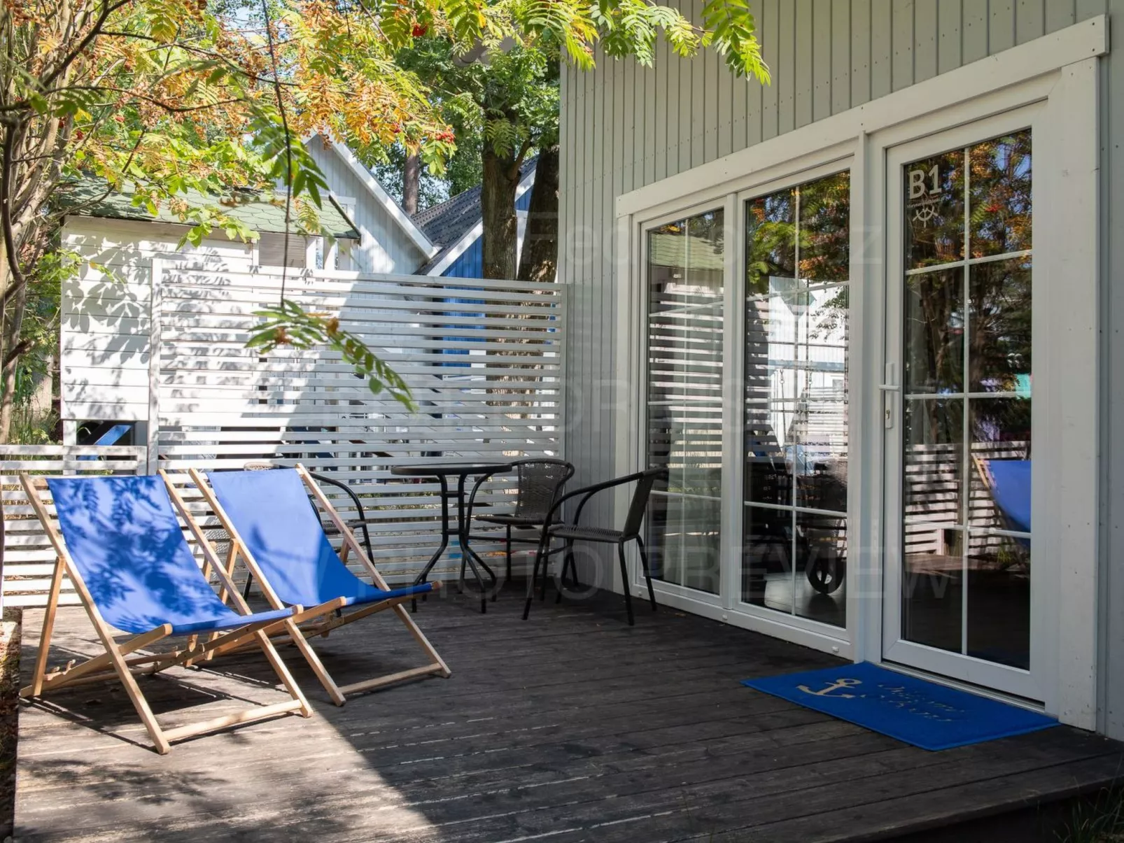 Marynarskie Domki mit der Aussicht auf Spielplatz-Buiten