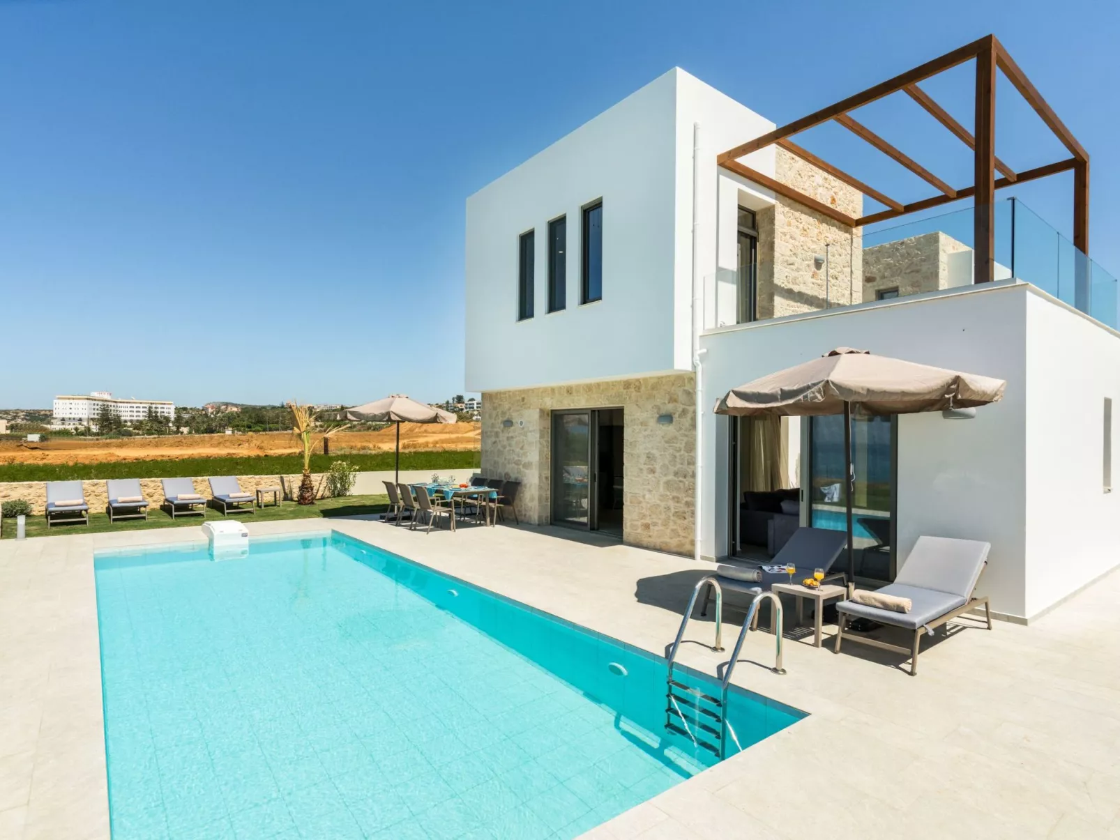 Villa am Strand mit Pool, Kinderbereich und BBQ-Buiten