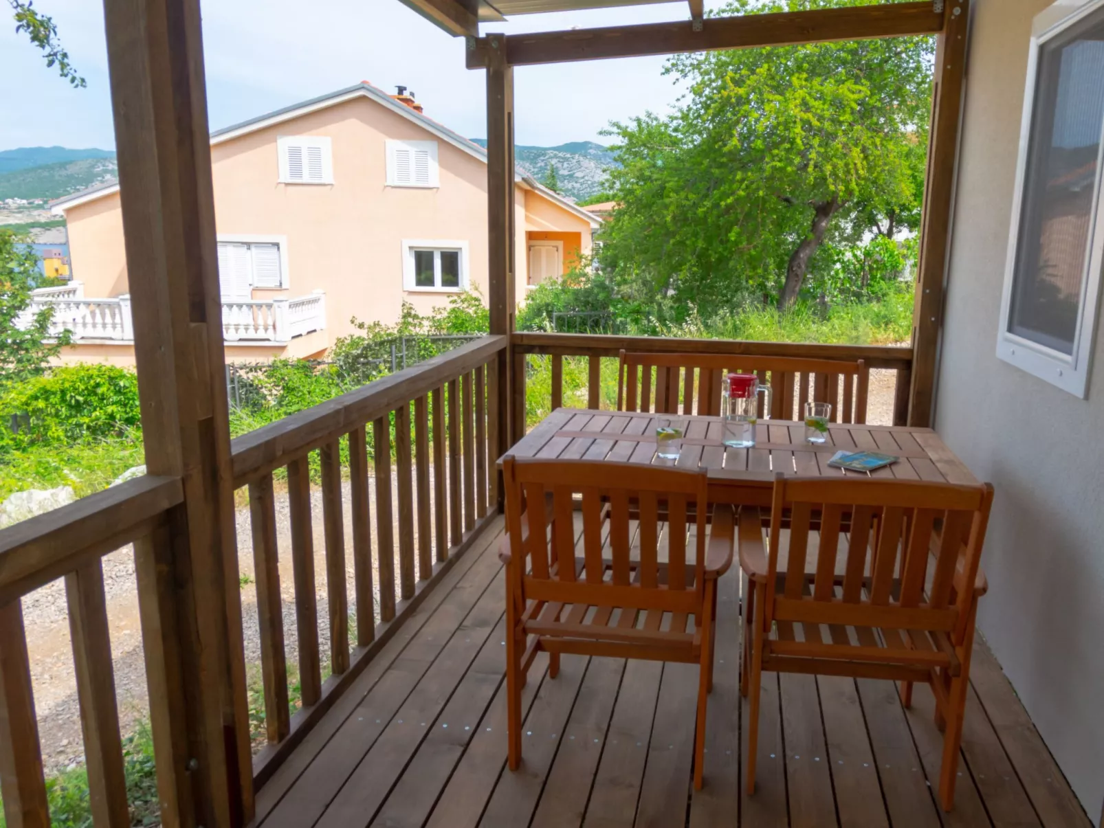 Mobilheim mit gemeinschaftlichem Pool-Buiten