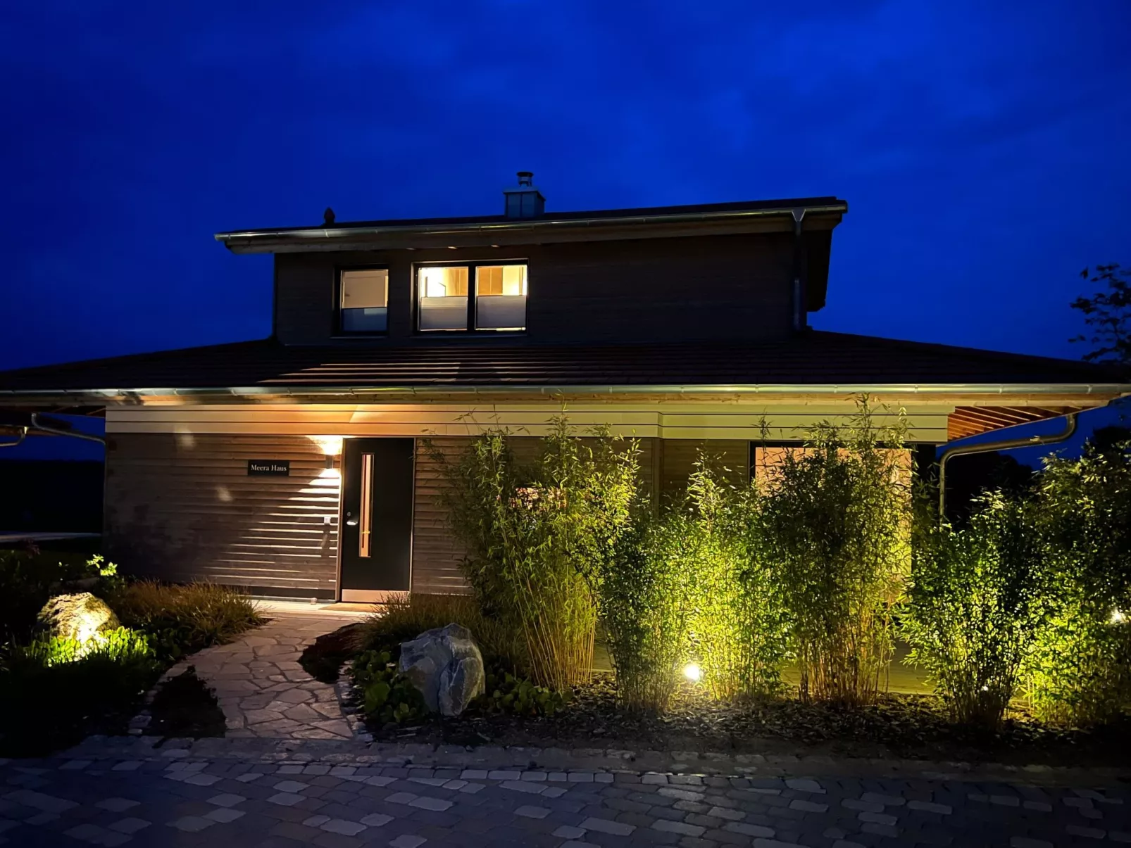 Meera Bio Holzhaus-Buiten