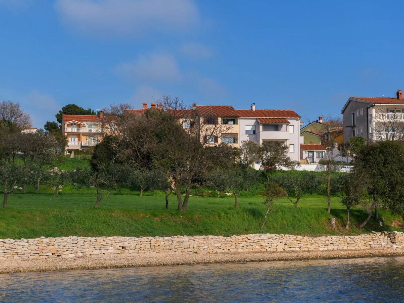 Direkt am Strand-Buiten