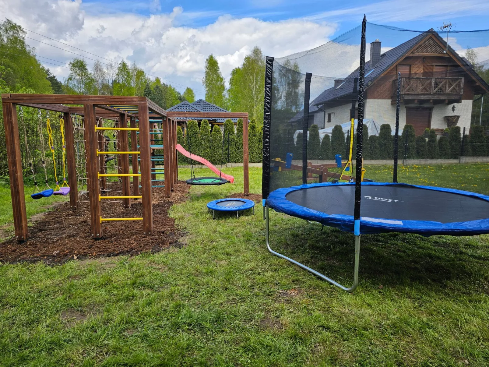 Ganzjährig bewohnbares Ferienhaus - rot-Buiten