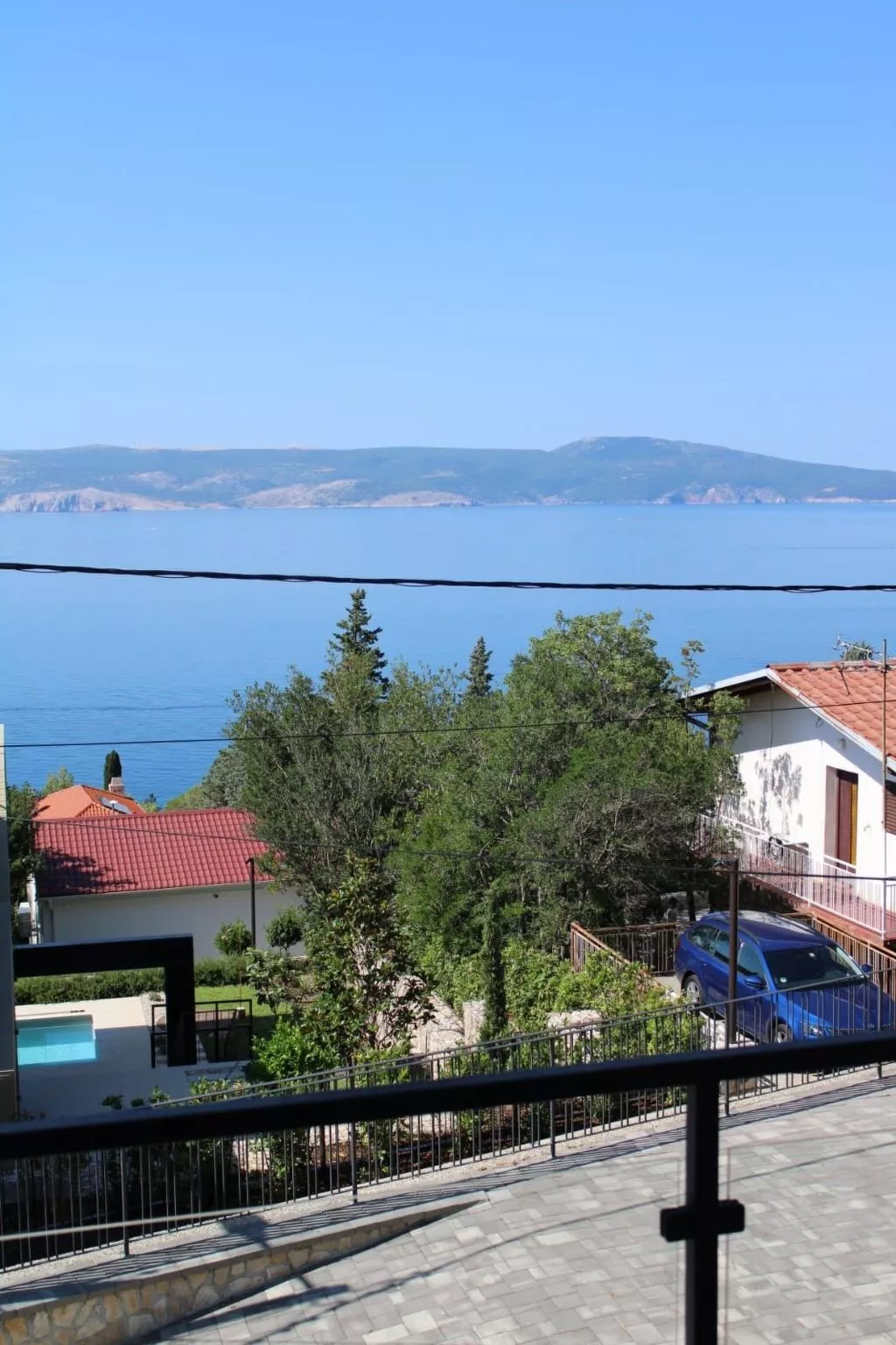Appartement mit Terrasse, Meerblick, Jacuzzi, Außenpool-Buiten