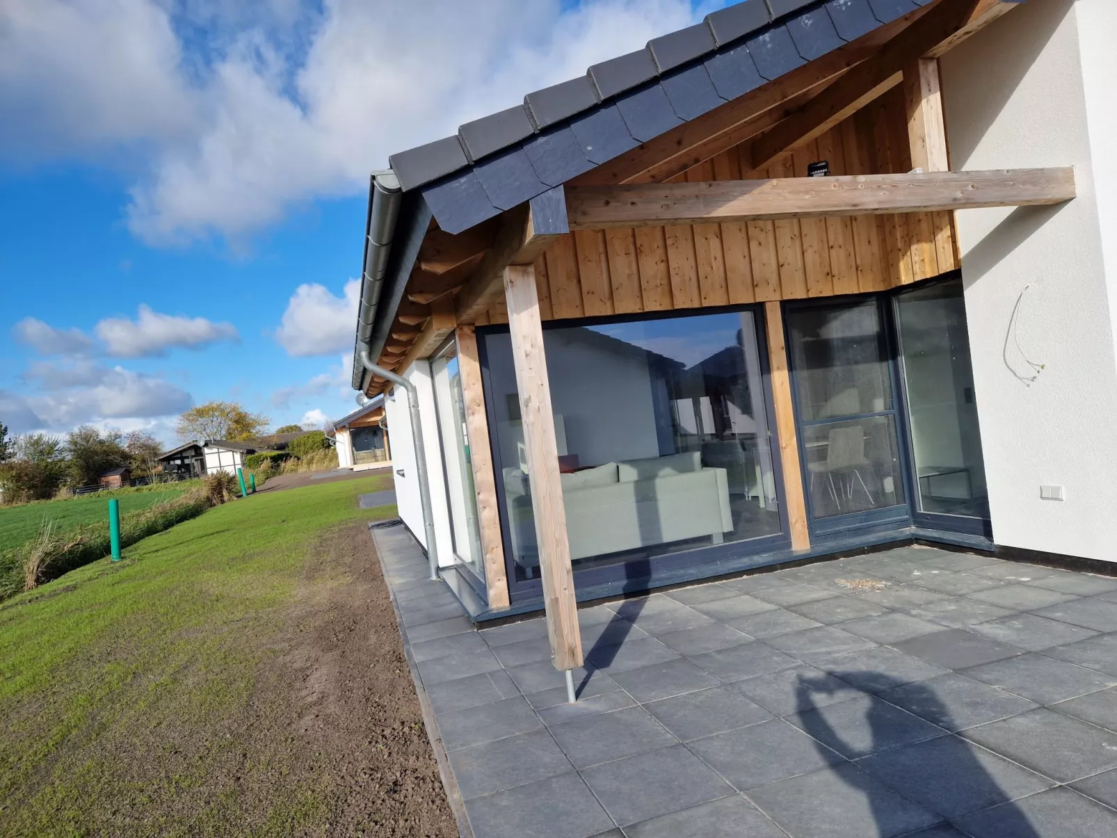 G18 Ferienhaus mit Wiesenblick in Eckwarderhörne-Buiten