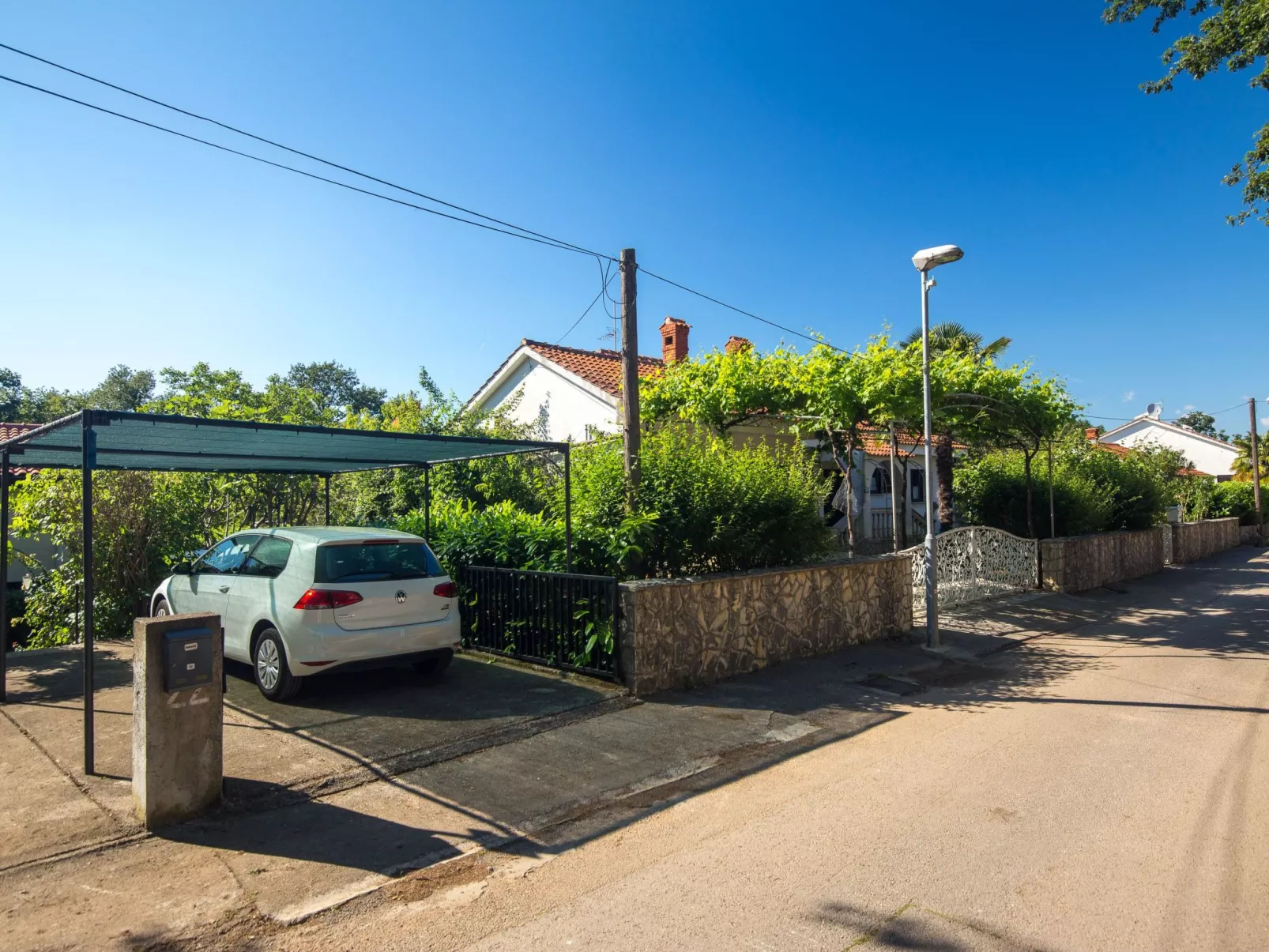 Wohnung "Villa Karmen" direkt am Strand-Buiten