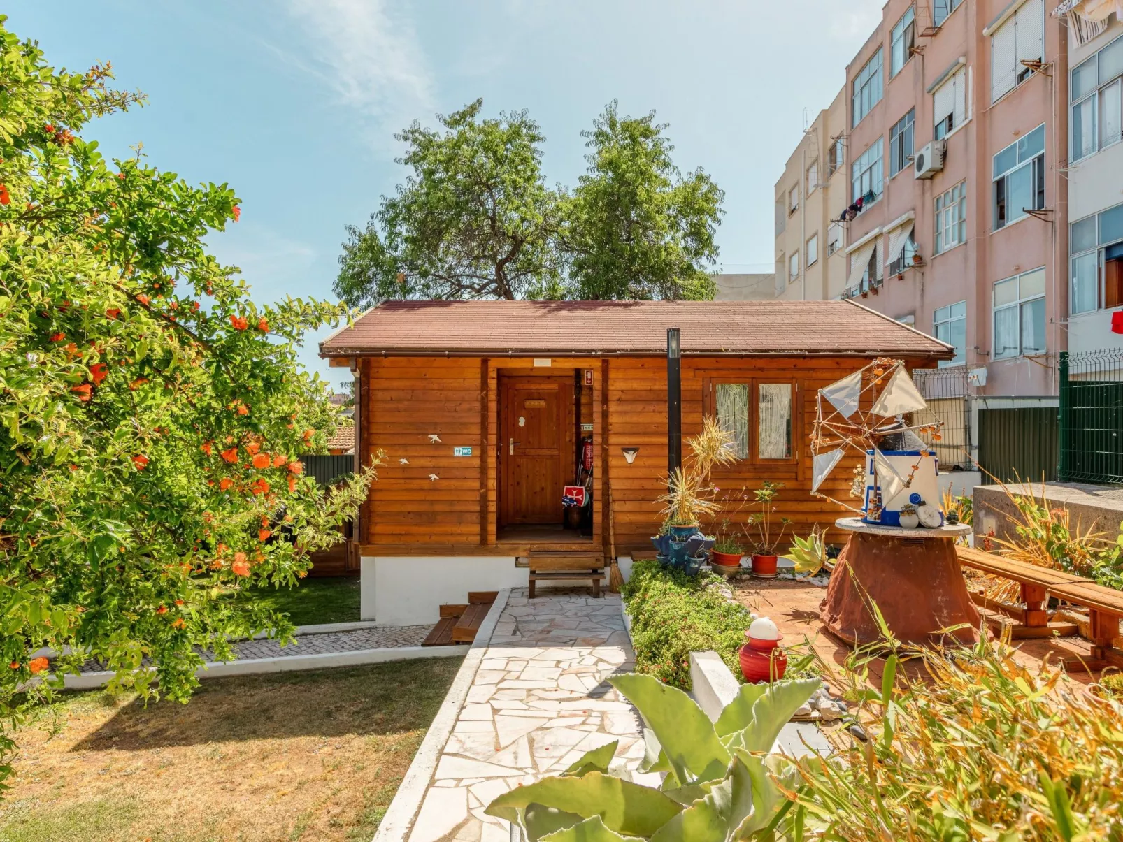 Nette Wohnung mit Kleinem gemeinsamem Pool - Buiten