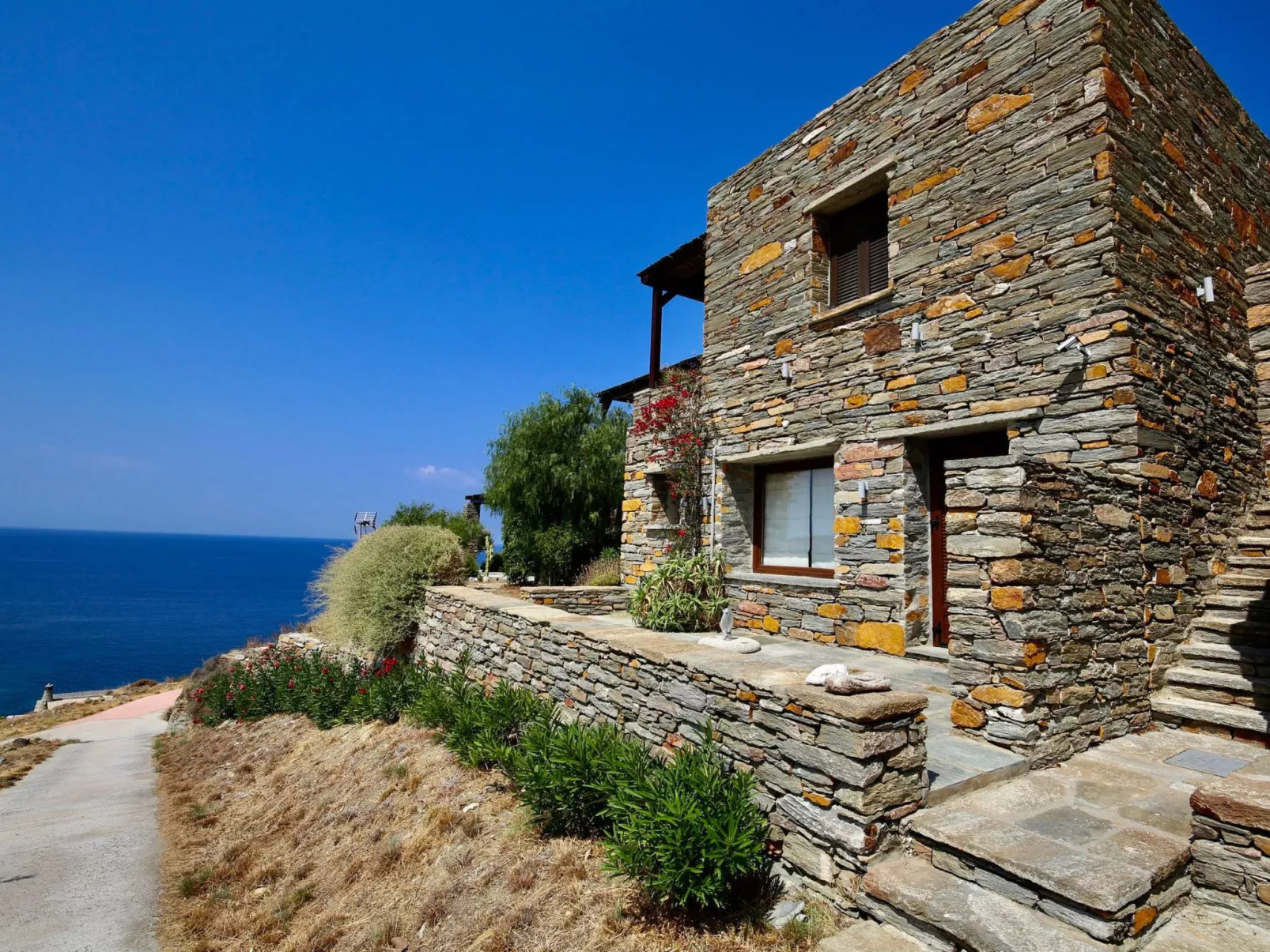 Luxuriöse, private Villa mit Meerblick, abgelegener Strand-Buiten