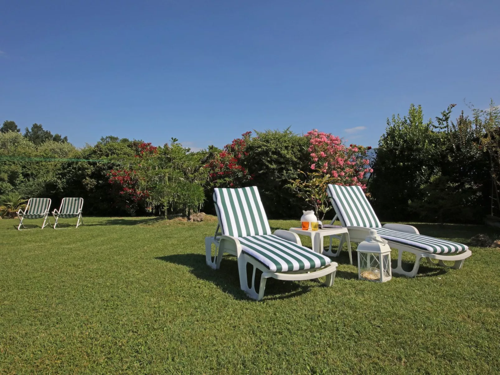 Geranium' Wohnung mit Schwimmbad-Buiten