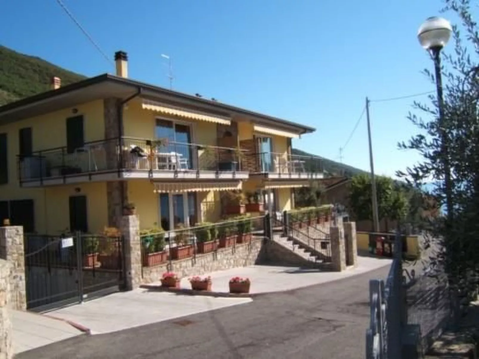 Wohnung 8 mit Seeblick, Garage, Schwimmbad,-Buiten