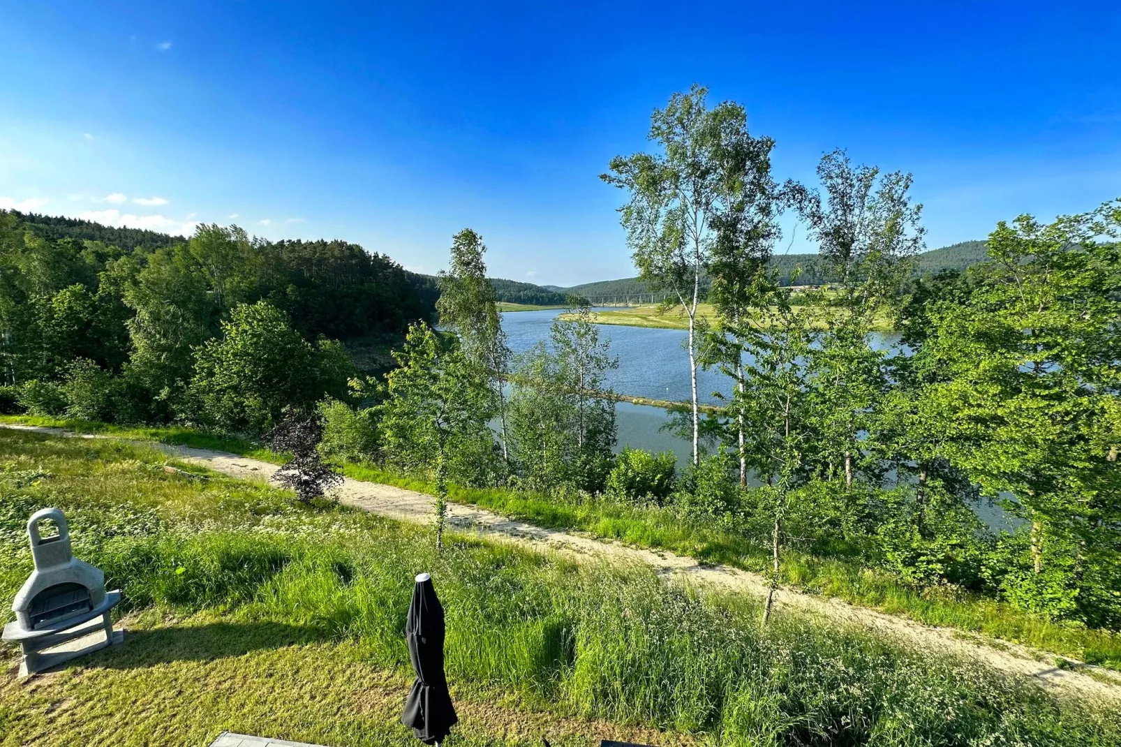 FERIENDORF SEEBLICK - Tiny Chalet am Eixendorfer See-Uitzicht zomer