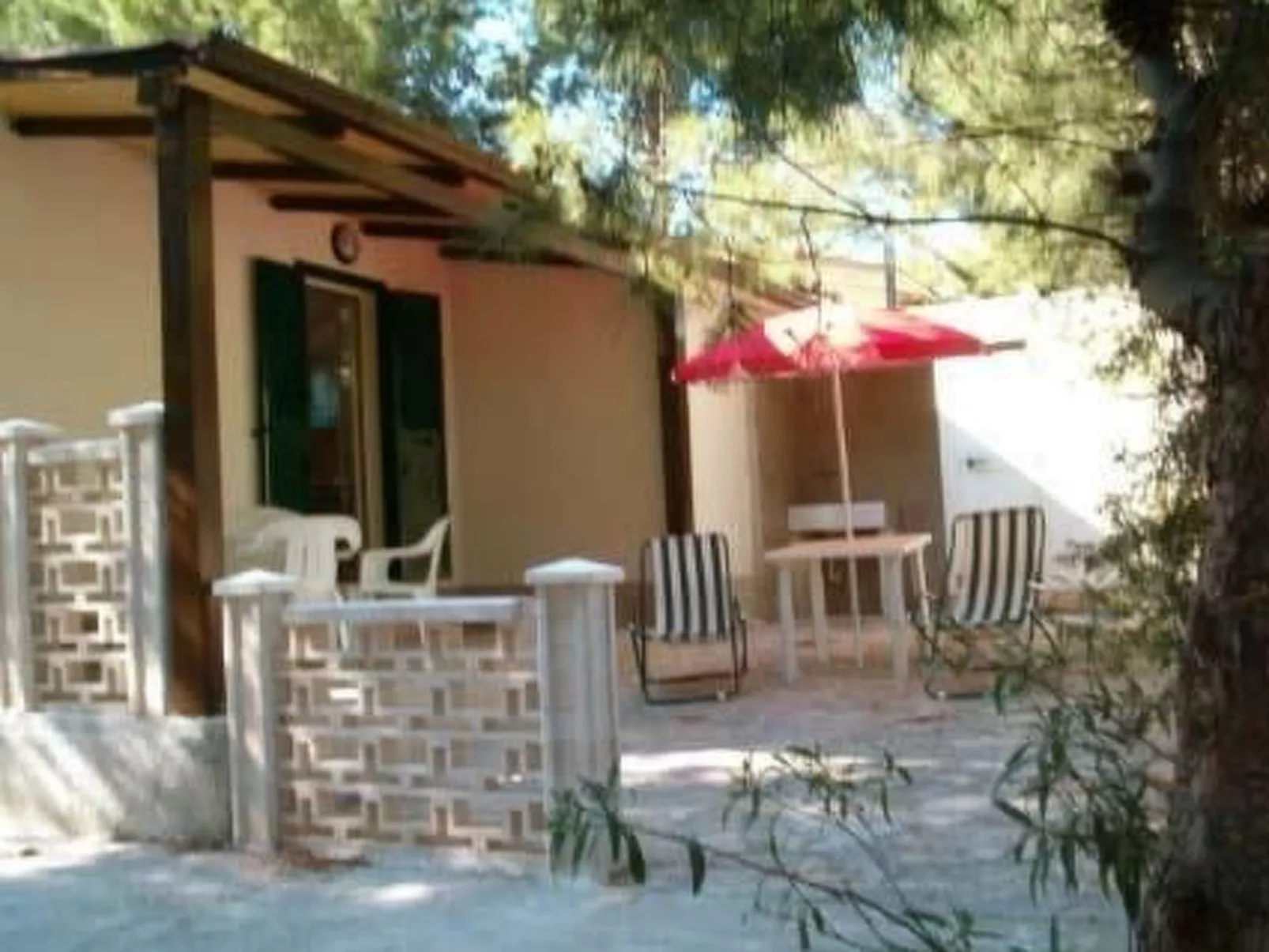 Orchideen-Ferienwohnung mit überdachter Veranda