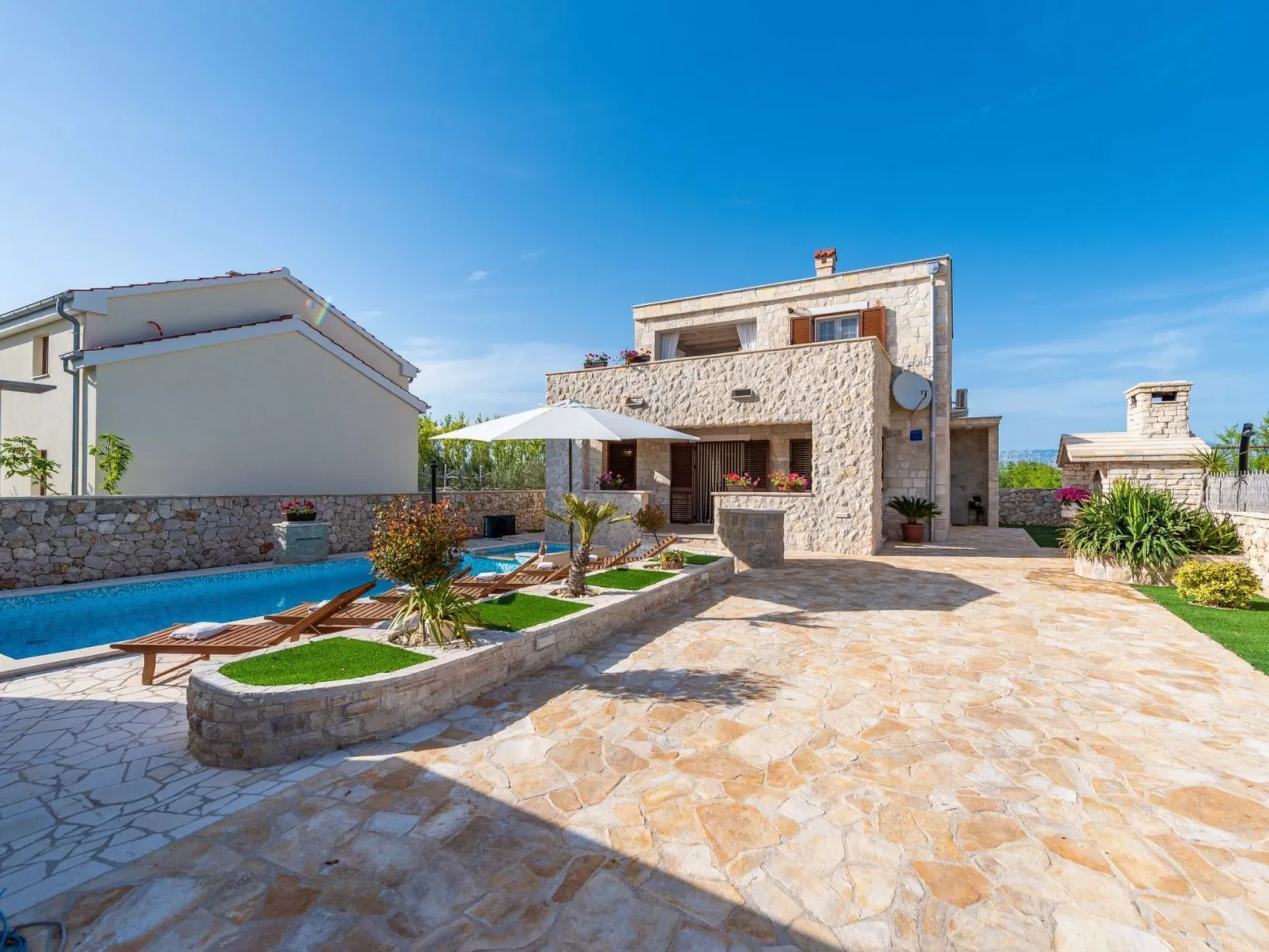 Villa Kirsten mit beheiztem Pool - von TA Leut Agency-Buiten