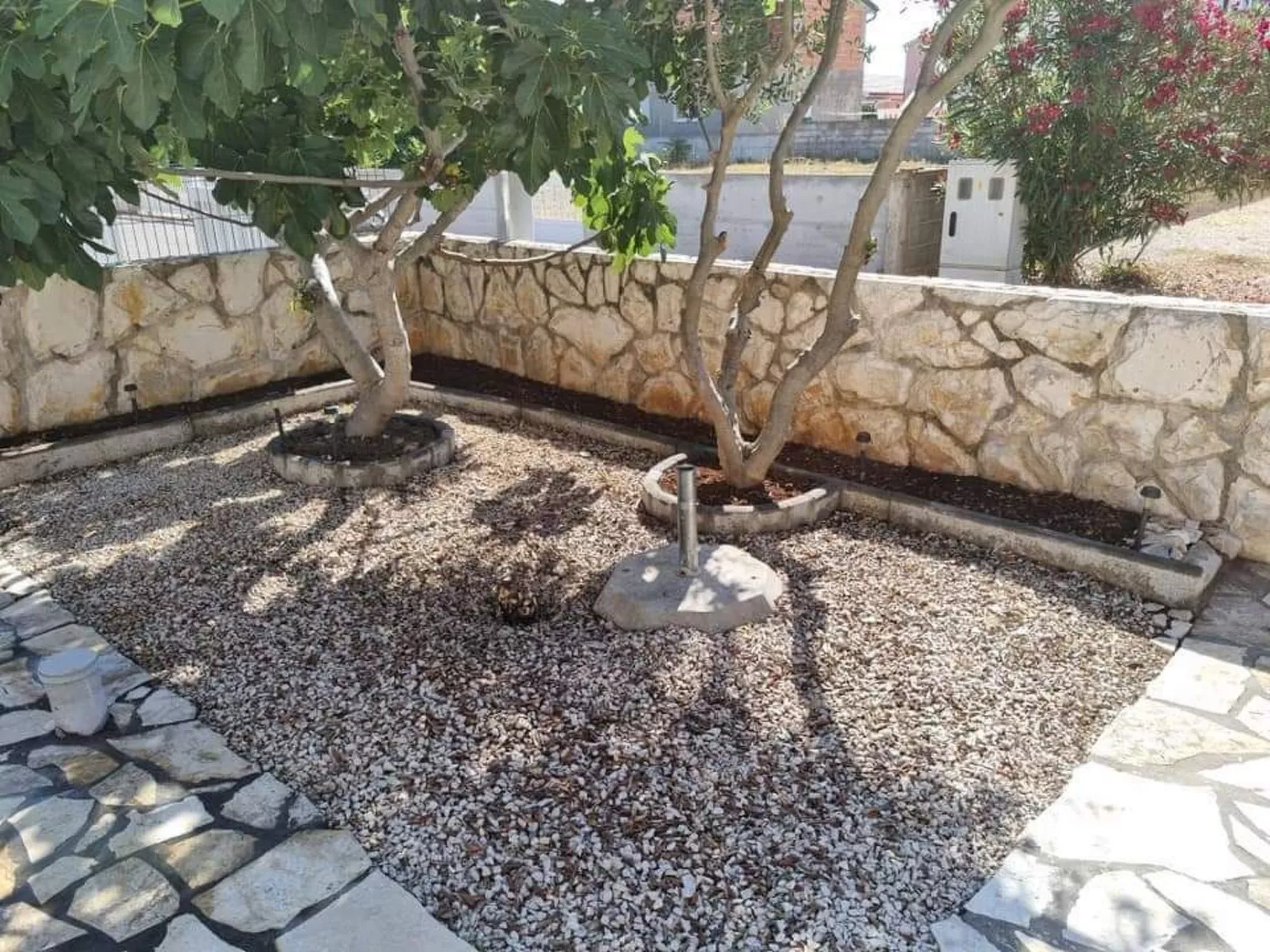 Charmante, sonnige Ferienwohnung-Buiten