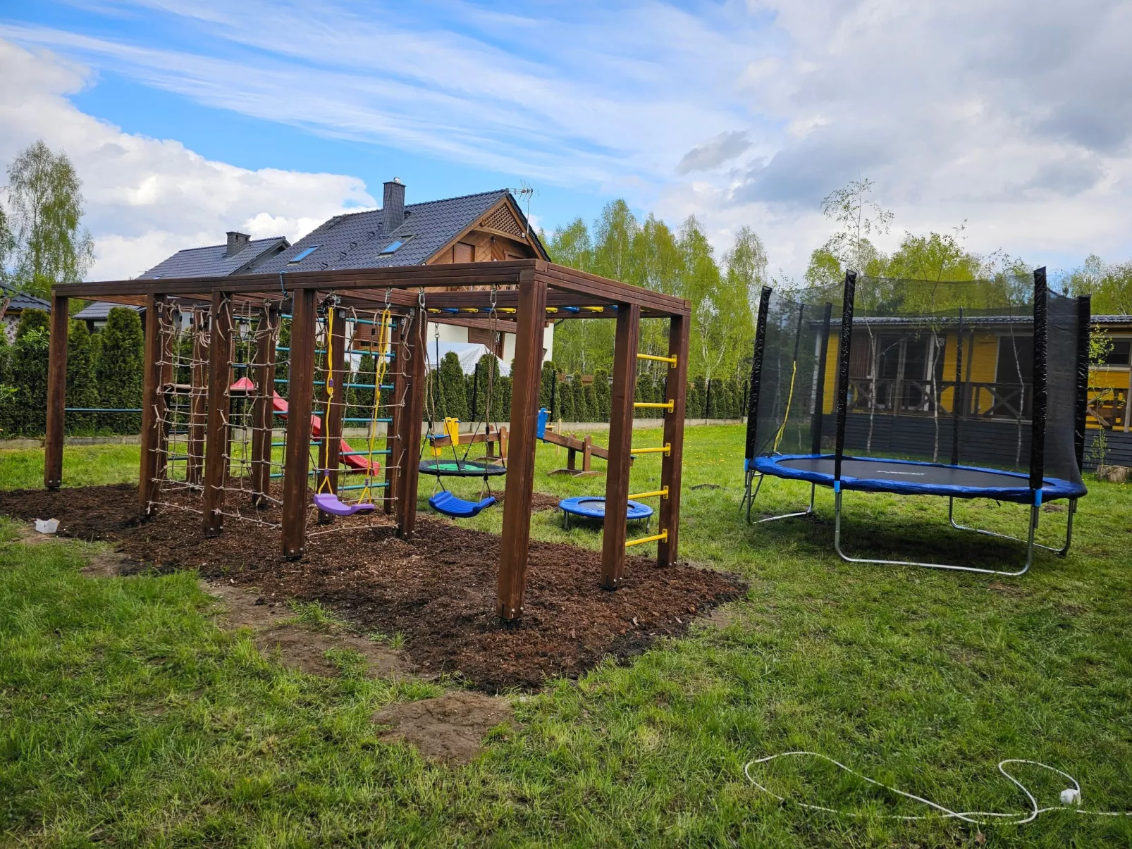 Ganzjährig bewohnbares Ferienhaus - rot-Buiten