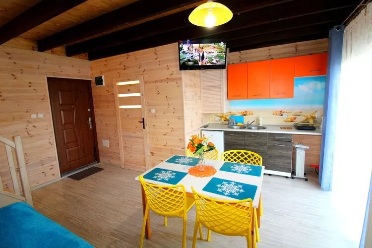 Piętrowe domki wakacyjne z 1 sypialnią w Rewalu