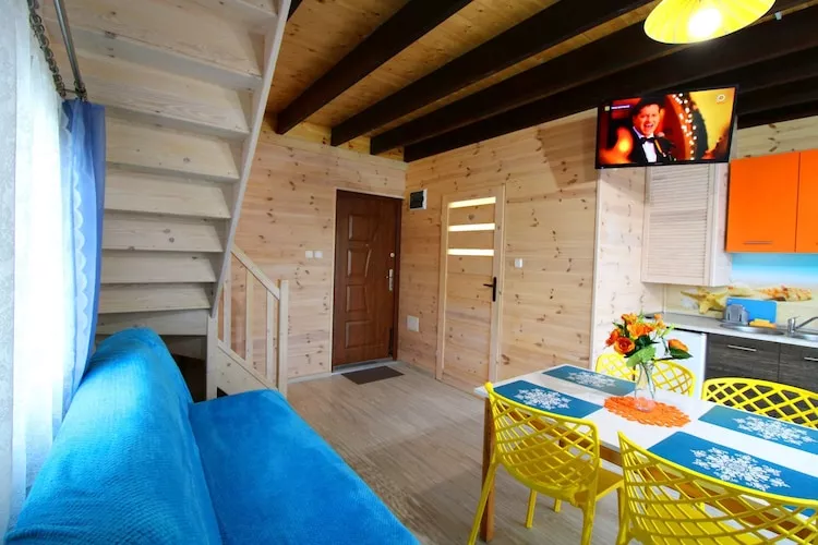 Piętrowe domki wakacyjne z 1 sypialnią w Rewalu-Woonkamer