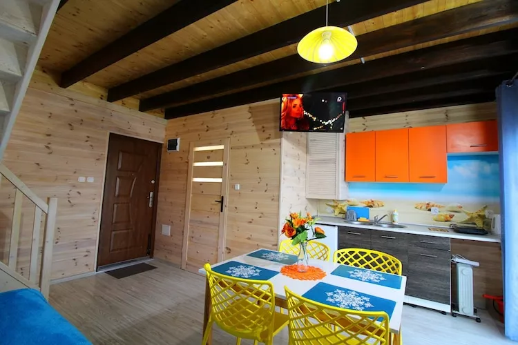 Piętrowe domki wakacyjne z 1 sypialnią w Rewalu-Woonkamer