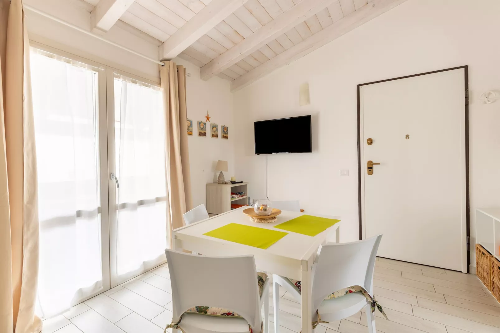 ATTICO BADESI CON PISCINA - Eetkamer