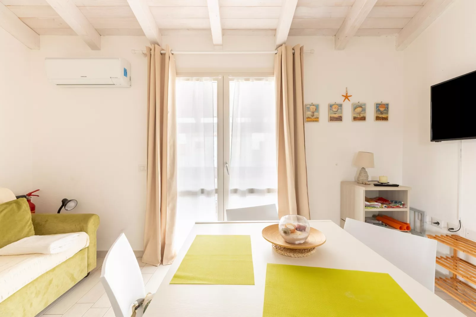 ATTICO BADESI CON PISCINA - Woonkamer